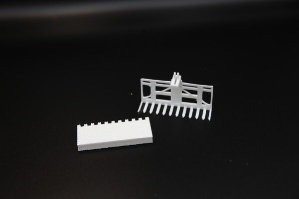 3D-geprinte Hulo steenklem met Hulo stenen op schaal 1:50